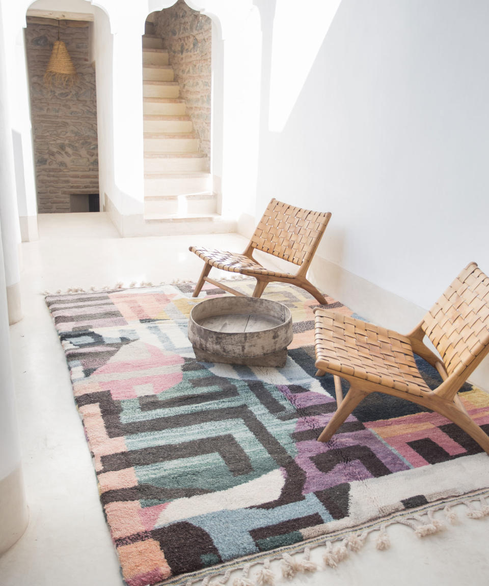 12. Add warmth and texture with a statement rug