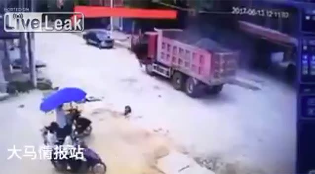 The driver hit the brakes after rolling over the boy. Source: LiveLeak