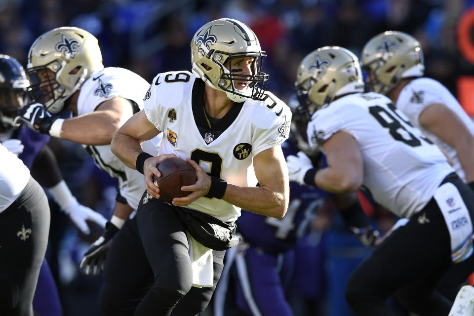 FILE - In this Oct. 21, 2018, file photo, New Orleans Saints quarterback Drew Brees drops back from the line of scrimmage during the first half of an NFL football game against the Baltimore Ravens in Baltimore. The 41-year-old Brees, who is the NFL's all-time leader in yards passing, completions and touchdowns, is entering his 20th NFL season and 15th with the Saints. (AP Photo/Gail Burton, File)