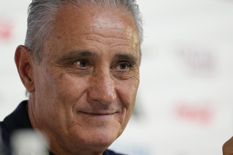 Brazil's head coach Tite listens to a question during a press conference on the eve of the group G of World Cup soccer match between Brazil and Switzerland, in Doha, Qatar, Sunday, Nov. 27, 2022. (AP Photo/Andre Penner)