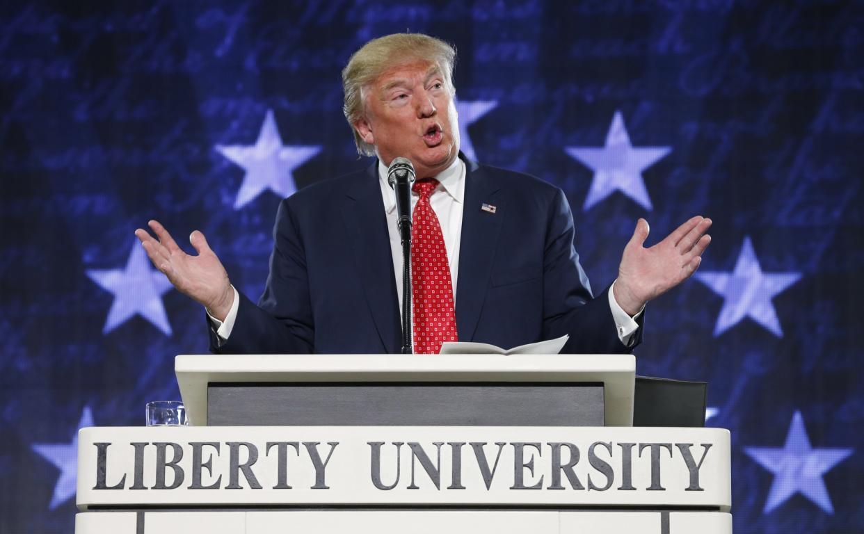 Presidential candidate Donald Trump gestures during a speech at Liberty University in Lynchburg, Va. in January 2016. (Photo: Steve Helber/AP)