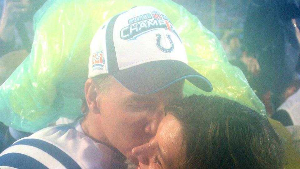 Peyton Manning (18) celebrates with his wife after a 29-17 victory over the Chicago Bears in Super Bowl XLI in Miami, Florida, on Sunday, February 4, 2007