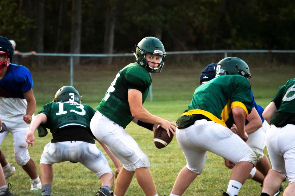 Will Thielen (Will Carleton Academy co-op athlete) looks to take over the quarterback position for the Rams, a position his older brother played on the team before him.