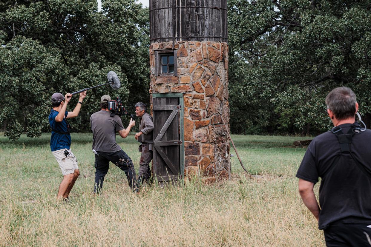 Actor Esai Morales emerges from an underground cell while crew captures the moment on in latest Okie-produced film, "Cottonmouth."