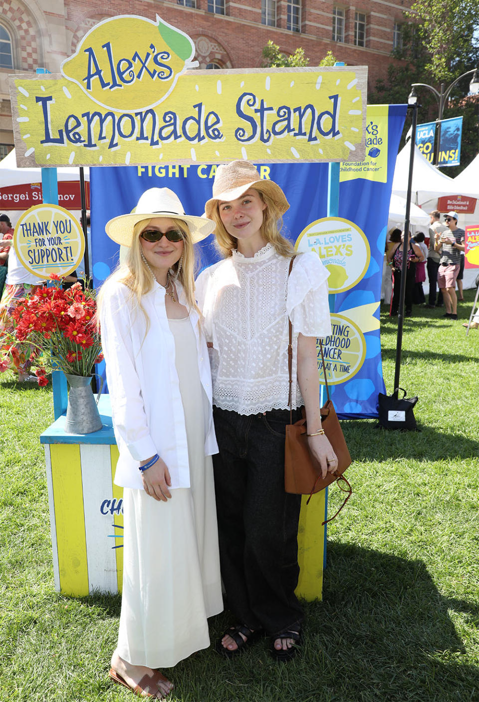 Dakota Fanning and Elle Fanning attend LA Loves Alex's Lemonade Stand 2023 Chefs Event at UCLA in Los Angeles CA on Saturday, September 23, 2023.