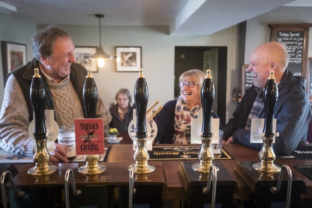 Embargoed to 0001 Friday March 3 Customers at the George and Dragon pub in Hudswell, North Yorkshire, which has been crowned the CAMRA Pub of the Year.