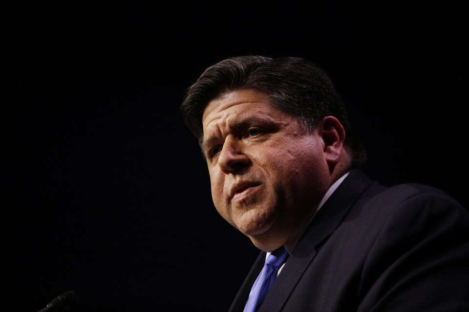 Illinois governor J.B. Pritzker apologizes after expressing disappointment that MLB players were 'holding out' for money. (Photo by Joshua Lott/Getty Images)