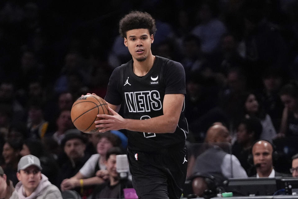 Atlanta Hawks' Trent Forrest looks to pass the ball during the second half of an NBA basketball game against the Atlanta Hawks, Thursday, Feb. 29, 2024, in New York. (AP Photo/Frank Franklin II)