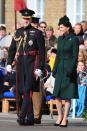<p>For her annual St. Patrick's Day visit to the Irish Guards, Kate Middleton wore a dark green Alexander McQueen coat, Kiki McDonough green tourmaline and amethyst drop earrings, a green fascinator, and the <a href="https://www.townandcountrymag.com/style/jewelry-and-watches/a26799974/kate-middleton-gold-shamrock-brooch-history/" rel="nofollow noopener" target="_blank" data-ylk="slk:traditional gold Shamrock brooch;elm:context_link;itc:0;sec:content-canvas" class="link ">traditional gold Shamrock brooch</a>. </p>