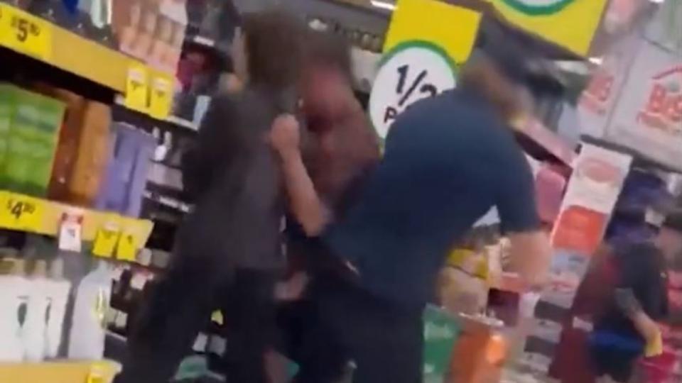 The brawl moved into the aisles. Picture: 9NEWS