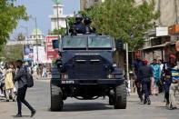 Anti-riot police deploy during a protest in Dakar