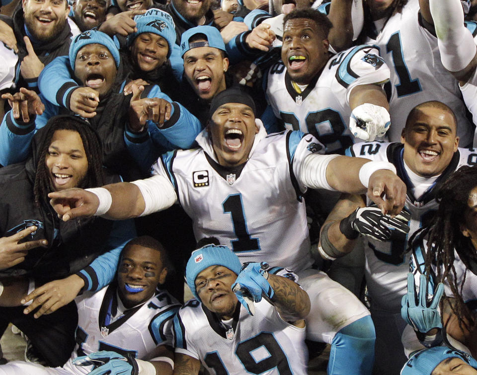 FILE - In this Jan. 24, 2016, file photo, Carolina Panthers' Cam Newton celebrates with teammates during the second half the NFL football NFC Championship game against the Arizona Cardinals in Charlotte, N.C. For the first time since the NFL created its current divisional structure back in 2002, there is talk of a potential dynasty in the NFC South. None of the division’s four teams managed even two straight first-place finishes until the Carolina Panthers did it in 2013 and 2014. Last season, the Panthers made it three straight and advanced to the Super Bowl. (AP Photo/Chuck Burton, File)