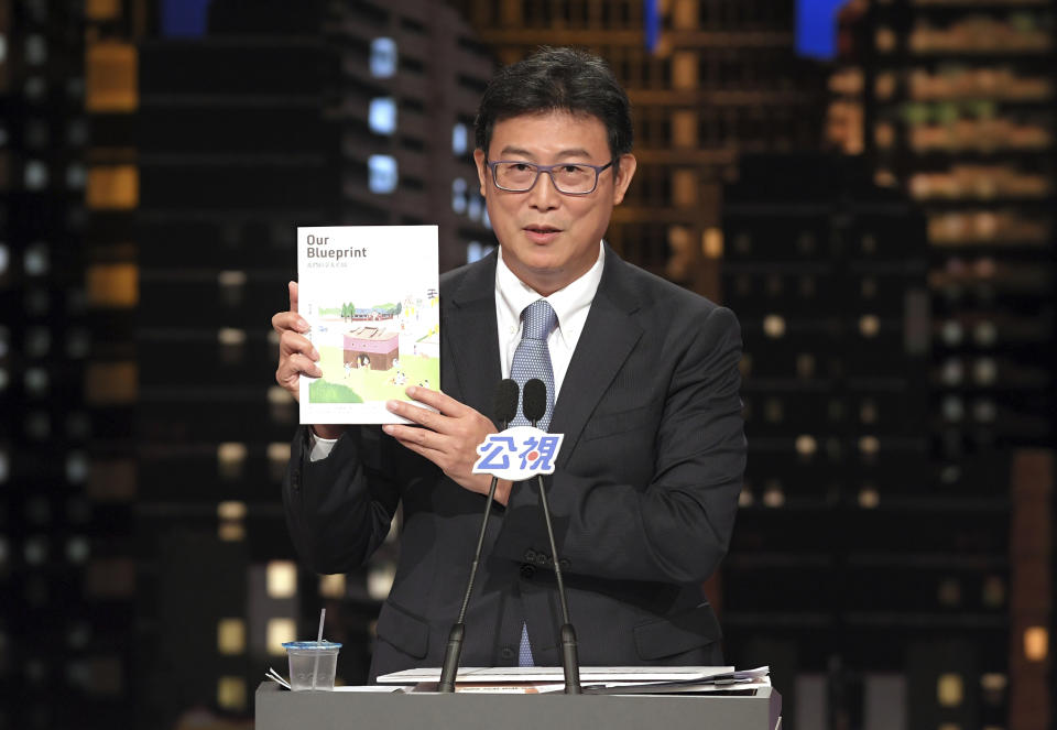 Ruling Democratic Progressive Party's candidate, Pasuya Yao speaks during the televised policy debate in Taipei, Taiwan, Saturday, Nov. 10, 2018. The candidates vying to become the mayor of Taiwan’s capital, Taipei, faced off in a televised debate on Saturday, two weeks before a host of local elections seen as a barometer of the ruling party’s popularity. (Pool Photo via AP)