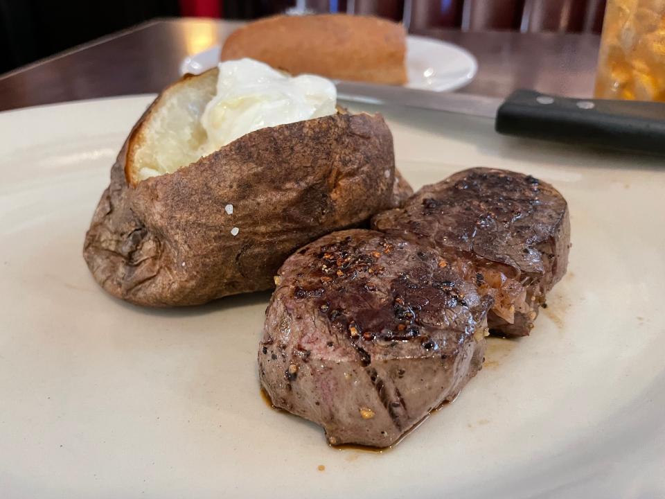 The simplicity of a 6-ounce fillet steak and a generously sized baked potato helps feed a need among Masters Tournament visitors.