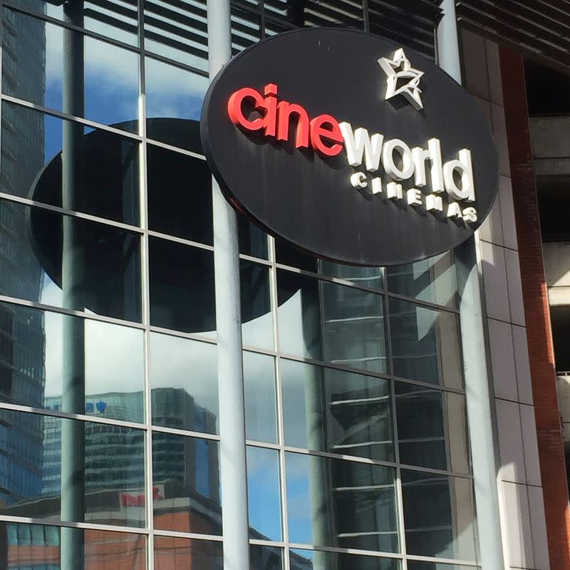 FILE PHOTO: A Cineworld cinema logo is pictured in Canary Wharf in London