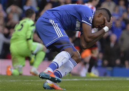 Chelsea's Samuel Eto'o reacts after missing a chance to score against Sunderland during their English Premier League soccer match at Stamford Bridge in London, April 19, 2014. REUTERS/Toby Melville