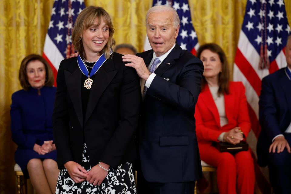 President Joe Biden awards the Medal of Freedom to U.S. Olympic gold medal swimmer Katie Ledecky during a ceremony in the East Room of the White House on May 3, 2024 in Washington, DC.