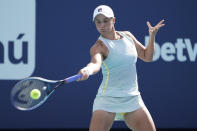 Ashleigh Barty, of Australia, returns to Kristina Kucova, of Slovania, during the Miami Open tennis tournament, Thursday, March 25, 2021, in Miami Gardens, Fla. (AP Photo/Marta Lavandier)