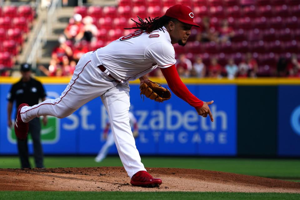 Cincinnati Reds starting pitcher Luis Castillo (58) follows through on a delivery during the first inning of a baseball game against the Miami Marlins, Wednesday, July 27, 2022, at Great American Ball Park in Cincinnati. 