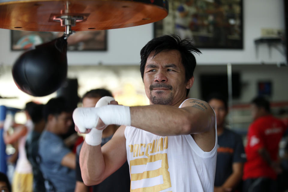 Manny Pacquiao is far removed from the glory days when he commanded briefcases full of money and bigger U.S. audiences. (Getty Images)