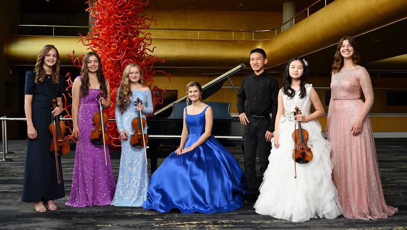 Sophie Wilkes, Alina Baron, Whitney Baron, Maya Marsh, Alvin Gao, Deann Huang and Anne Turner pose for the 2023 Salute to Youth Portraits at Abravanel Hall in Salt Lake City on Wednesday, Oct. 4, 2023.