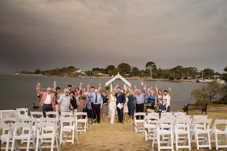 The couple and their guests can be seen waving at the camera in celebration. Source: Rebecca Farley Photography