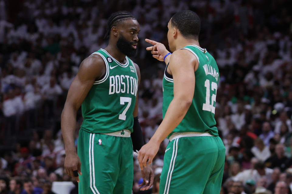 Boston Celtics teammates Jaylen Brown and Grant Williams celebrate during the fourth quarter of their Game 4 victory against the Miami Heat in the Eastern Conference finals. (Megan Briggs/Getty Images)