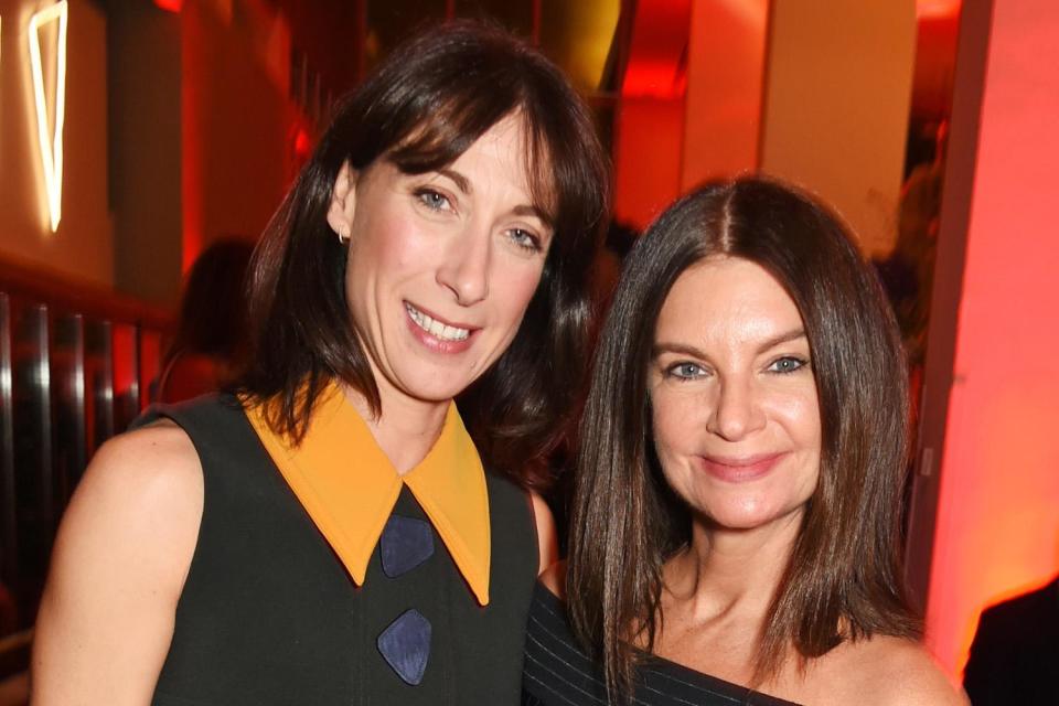 Double trouble: Samantha Cameron and Dame Natalie Massenet (Photo by David M. Benett/Dave Benett/Getty Images): Dave Benett/Getty Images