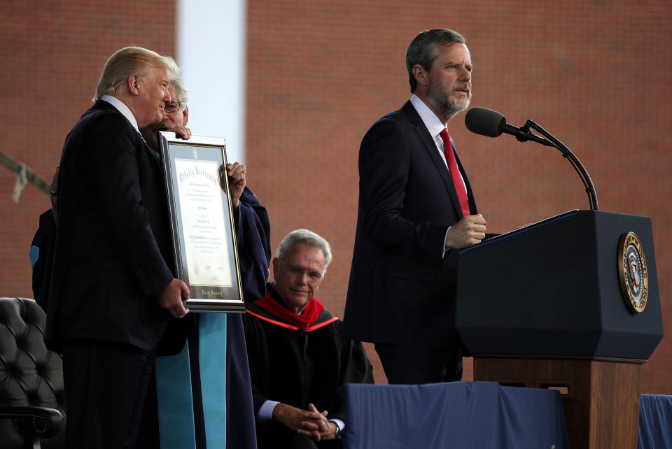 Jerry Falwell Jr. speaks as President Trump is presented with a Doctorate of Laws&nbsp; during a commencement at Liberty University on May 13, 2017, in Lynchburg, Virginia. (Photo: Alex Wong via Getty Images)