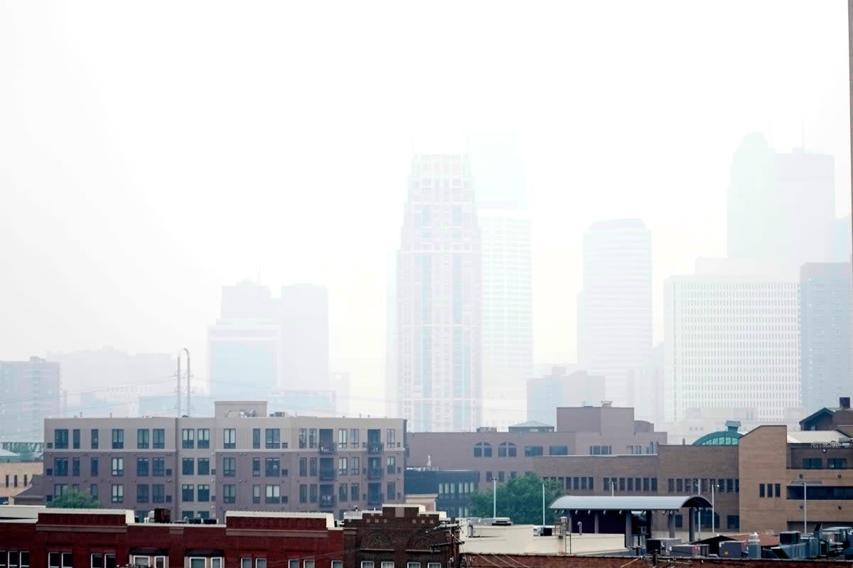 Haze envelopes the Minneapolis skyline from smoke drifted over from the wildfires in Canada, Wednesday, June 14, 2023, in Minneapolis (Copyright 2023 The Associated Press. All rights reserved)