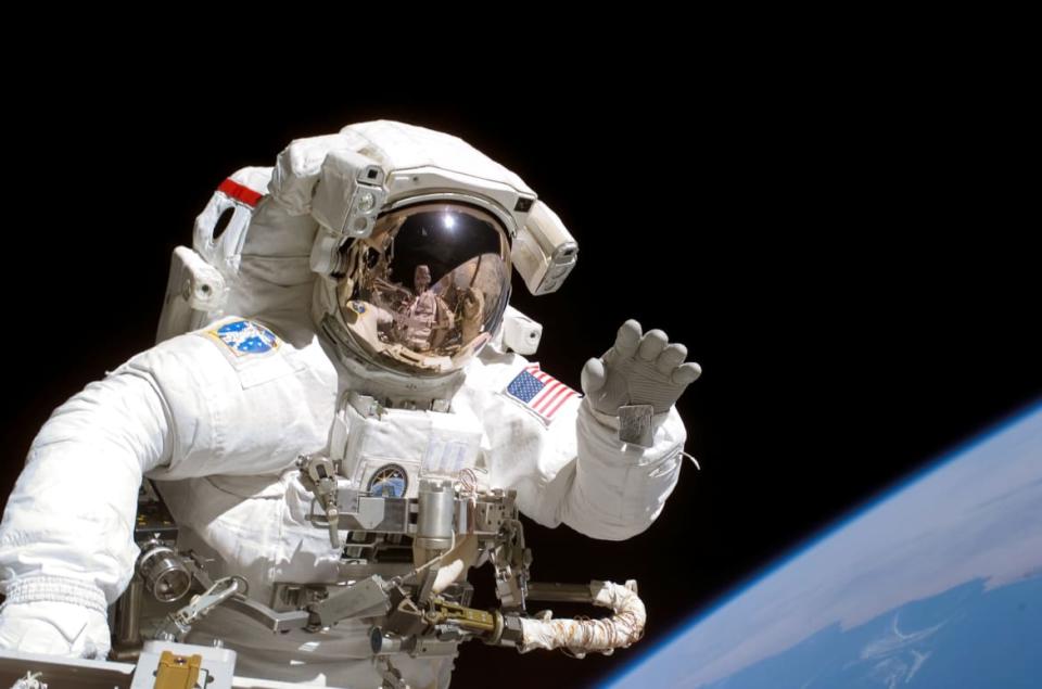 <div class="inline-image__caption"><p>American astronaut Joseph Tanner waves to the camera during a space walk as part of the STS-115 mission to the International Space Station, September 2006. </p></div> <div class="inline-image__credit">NASA/Getty</div>