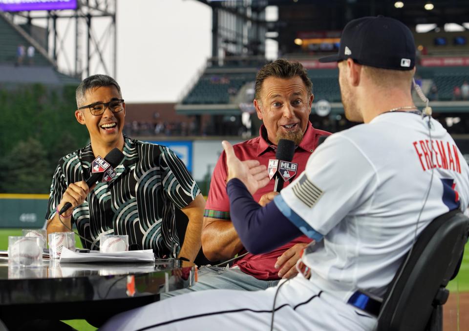 Co-hosts Stephen Nelson, left, and Kevin Millar, center, talk with Los Angeles Dodgers first baseman Freddie Freeman during a taping of MLB Network's "Intentional Talk." The show is set to do a live broadcast from UFCU Disch-Falk Field on Thursday.