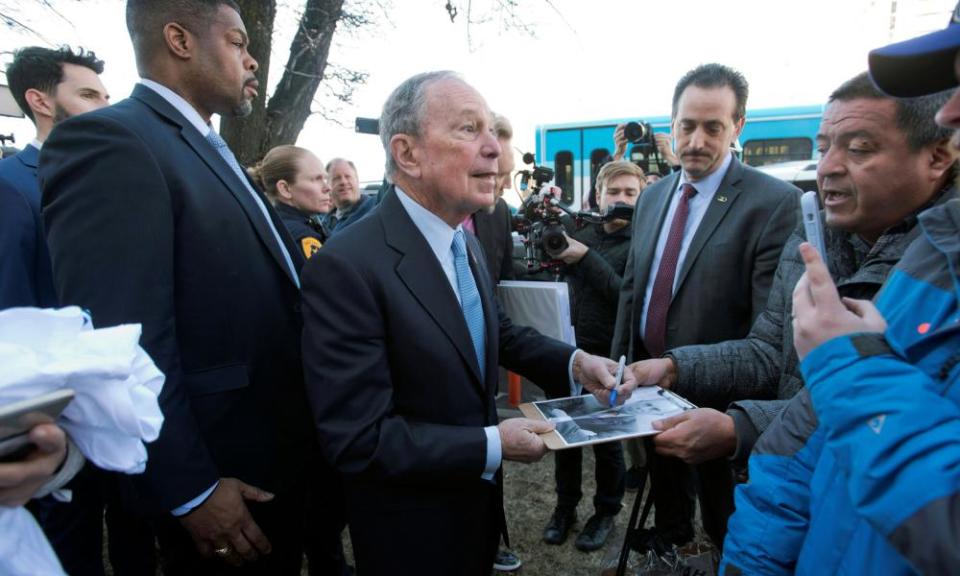 Mike Bloomberg signs a photo for a fan after a campaign rally in Salt Lake City, Utah, on Thursday.