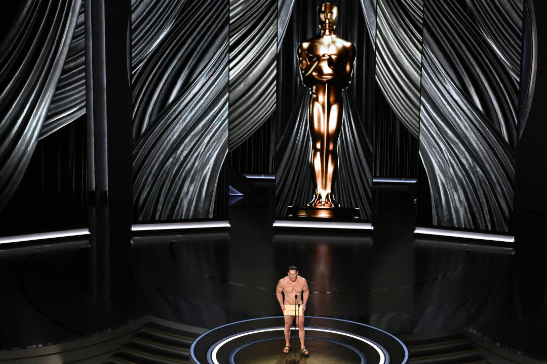 US actor John Cena presents the award for Best Costume Design onstage during the 96th Annual Academy Awards at the Dolby Theatre in Hollywood, California on March 10, 2024. (Photo by Patrick T. Fallon / AFP) (Photo by PATRICK T. FALLON/AFP via Getty Images)