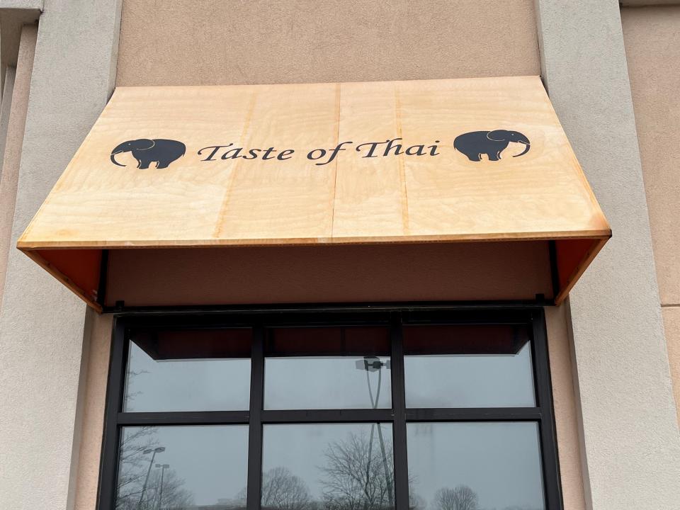 Signs remain on the empty Taste of Thai restaurant in Cedar Bluff on Jan. 10, 2023, following its recent closing.