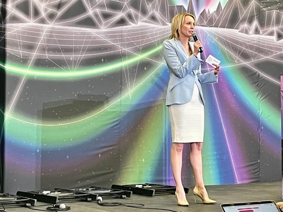 <em>Blockchain Association Executive Director Kristin Smith gives an upbeat political update on Saturday.</em> Photo by Brady Dale.