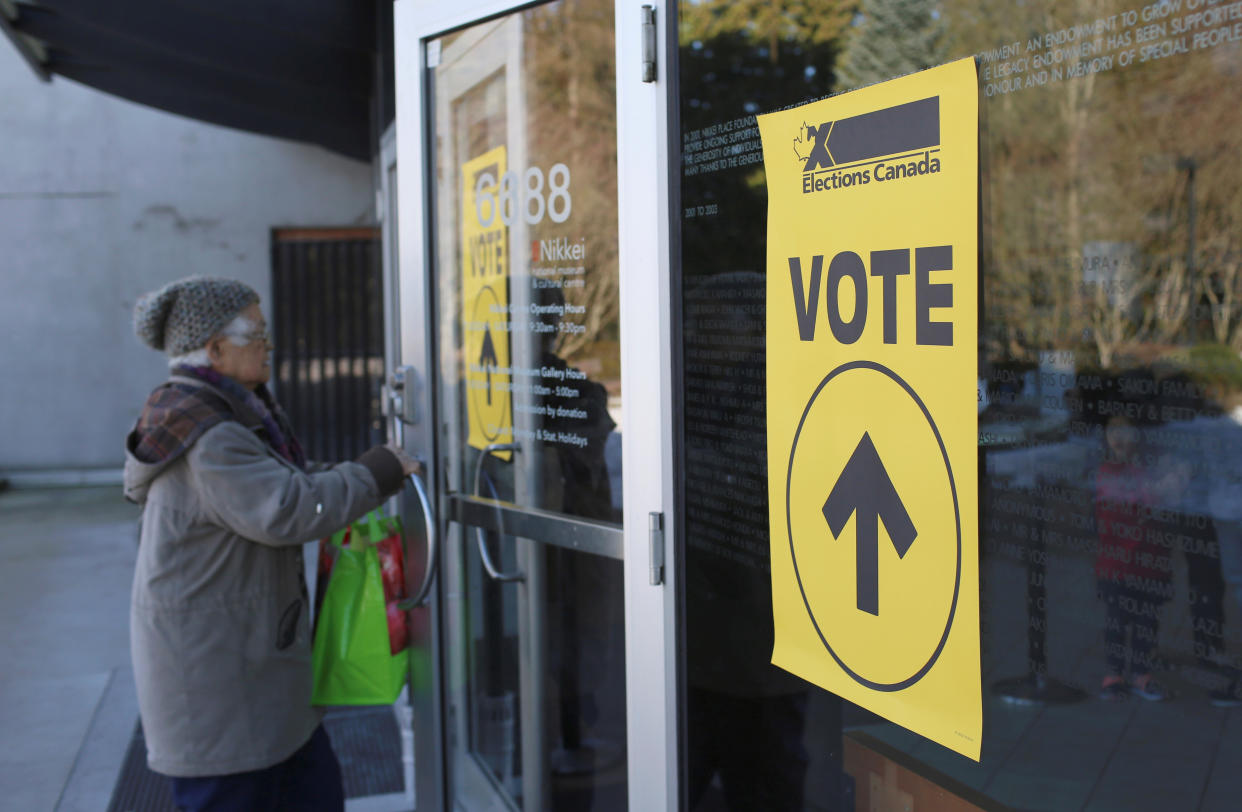 A man enters a polling station during the Burnaby South federal by-election in Burnaby, British Columbia, Canada, February 25, 2019.  REUTERS/Ben Nelms