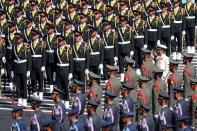 FILE PHOTO: Members of Iran's Armed Forces stand during a graduation ceremony for armed Forces Officers' Universities at the police academy in Tehran