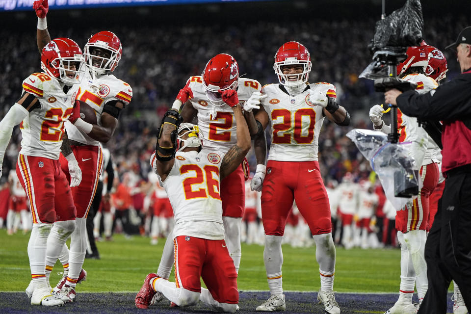 Kansas City Chiefs safety Deon Bush (26) celebrates his interception against the Baltimore Ravens in the end zone during the second half of an AFC Championship NFL football game, Sunday, Jan. 28, 2024, in Baltimore. (AP Photo/Julio Cortez)