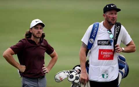 England's Tommy Fleetwood, left, reacts on the 18th hole during the third round of the DP World Tour Championship golf tournament in Dubai, United Arab Emirates, Saturday, Nov. 17, 2018 - Credit:  AP