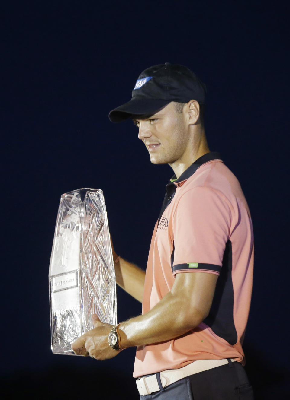 Martin Kaymer of Germany, holds The Players championship trophy at TPC Sawgrass, Sunday, May 11, 2014 in Ponte Vedra Beach, Fla. (AP Photo/Gerald Herbert)