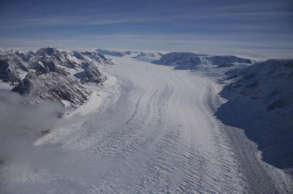 An Antarctic glacier flows toward the sea. Erin Pettit