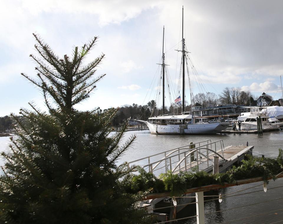 The Spirit of Massachusetts, a former schooner and restaurant on the Kennebunk River, is removed from the water and set on a cradle on land on Nov. 28, 2023. The historic ship will join a new dining establishment on Western Avenue.