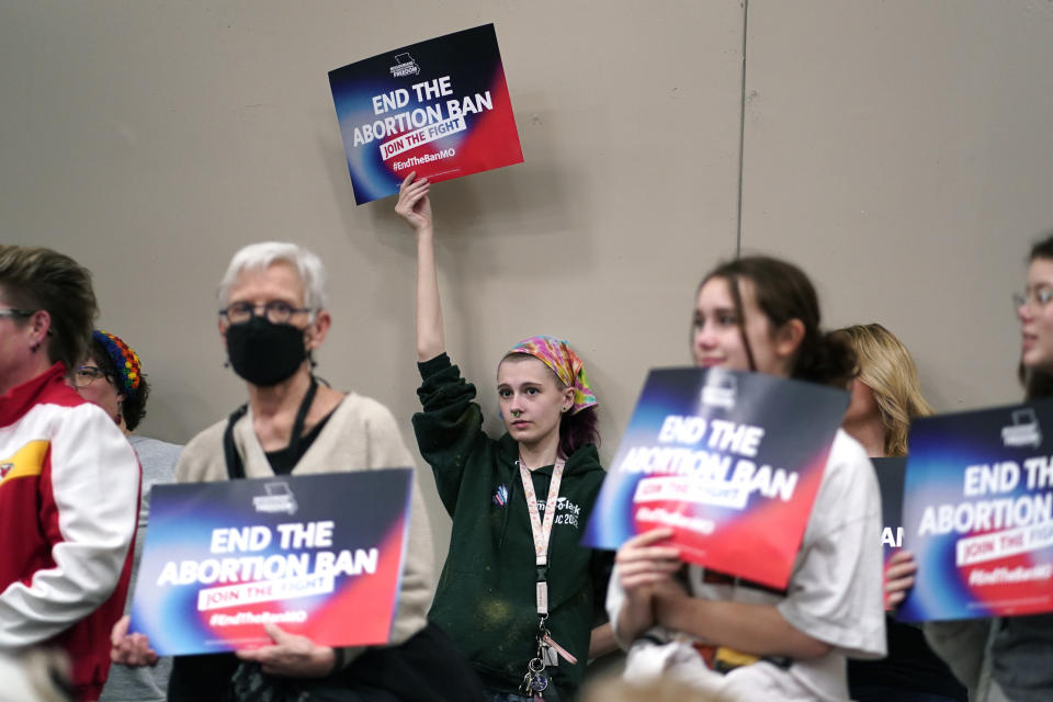 FILE - A supporter holds up a sign during Missourians for Constitutionals Freedom kick-off petition drive, Tuesday, Feb. 6, 2024, in Kansas City, Mo. Missouri senators on Wednesday, Feb. 7, 2024, voted against amending the state's strict law against abortions to allow exceptions in cases of rape and incest. (AP Photo/Ed Zurga, File)