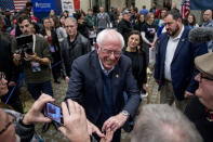 Democratic presidential candidate Sen. Bernie Sanders, I-Vt., greets member of the audience after speaking at a campaign stop at St. Ambrose University, Saturday, Jan. 11, 2020, in Davenport, Iowa. (AP Photo/Andrew Harnik)