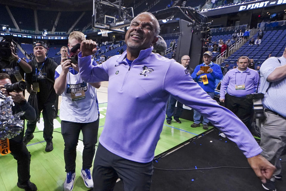 Kansas State head coach Jerome Tang ceclebrates after defeating Kentucky in a second-round college basketball game in the NCAA Tournament on Sunday, March 19, 2023, in Greensboro, N.C. (AP Photo/John Bazemore)