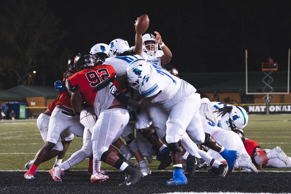 UWF quarterback Peewee Jarrett lunges for the two-point conversion, and win, at Valdosta State on Nov. 5, 2022.