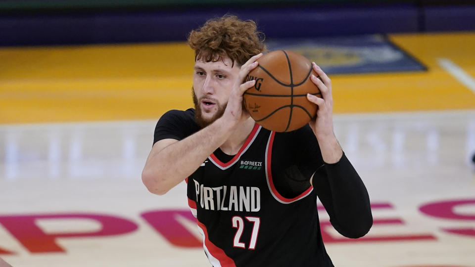 Portland Trail Blazers center Jusuf Nurkic (27) makes a pass during the fourth quarter of an NBA basketball game against the Los Angeles Lakers Monday, Dec 28, 2020, in Los Angeles. (AP Photo/Ashley Landis)