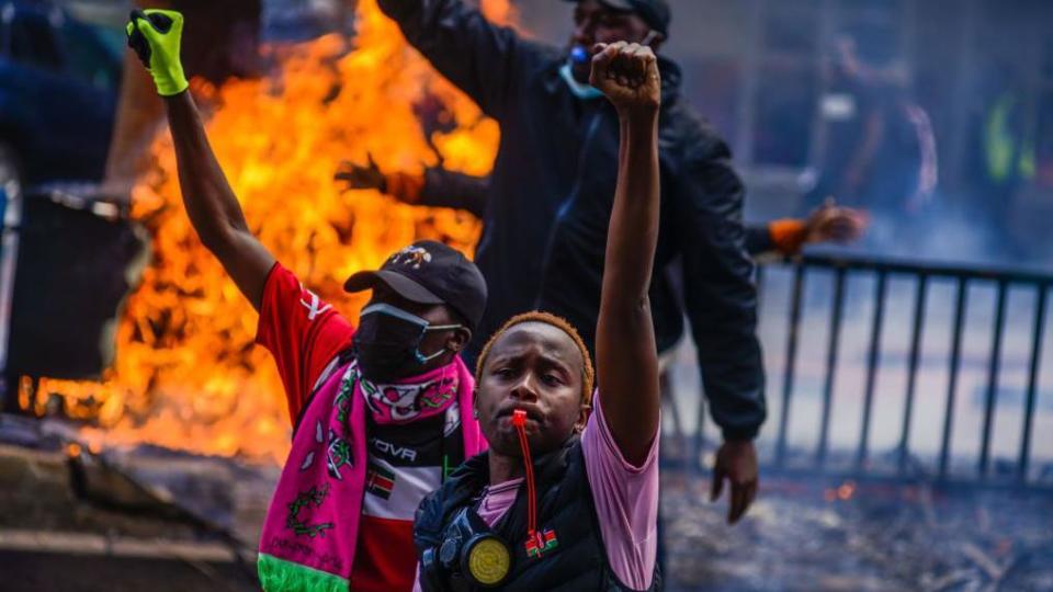 People clash with police during a protest against the tax hikes in planned 'Finance Bill 2024' as they march to the parliament building in Nairobi, Kenya on June 25