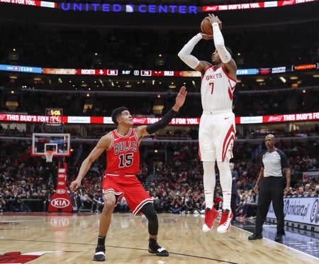 Nov 3, 2018; Chicago, IL, USA; Houston Rockets forward Carmelo Anthony (7) shoots against Chicago Bulls forward Chandler Hutchison (15) during the second half at United Center. Kamil Krzaczynski-USA TODAY Sports